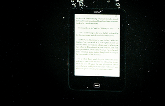a tablet working while submerged underwater because of HZO's electronic protective coatings