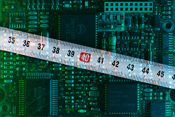 measuring how thick a printed circuit board's parylene coating will be