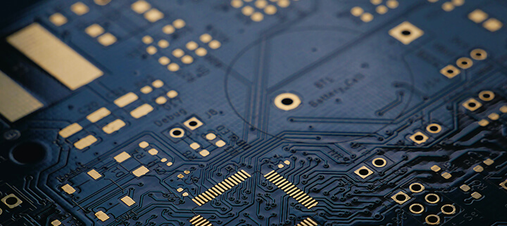 a close up of a parylene coated circuit board